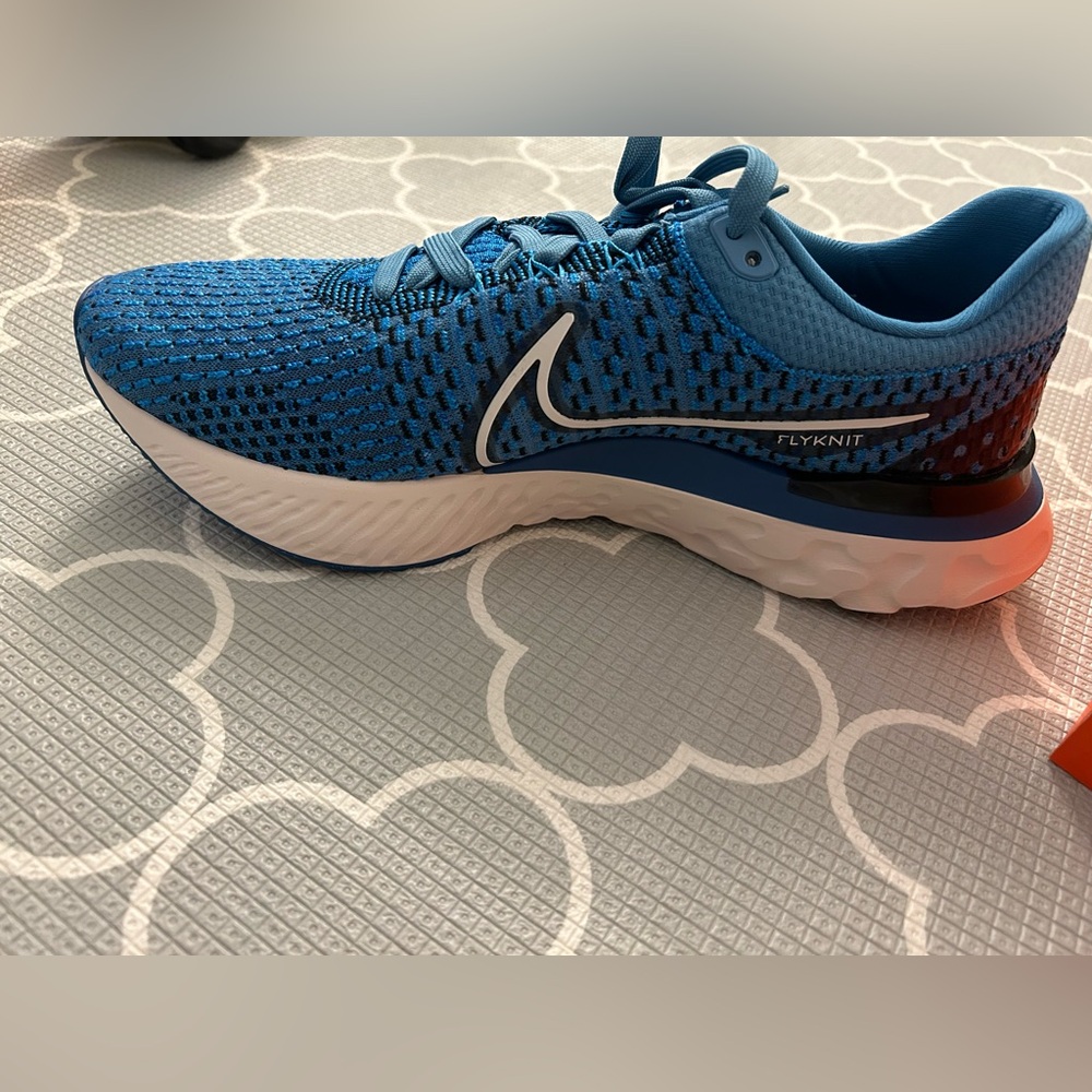 Nike Blue Flyknit Athletic Shoes